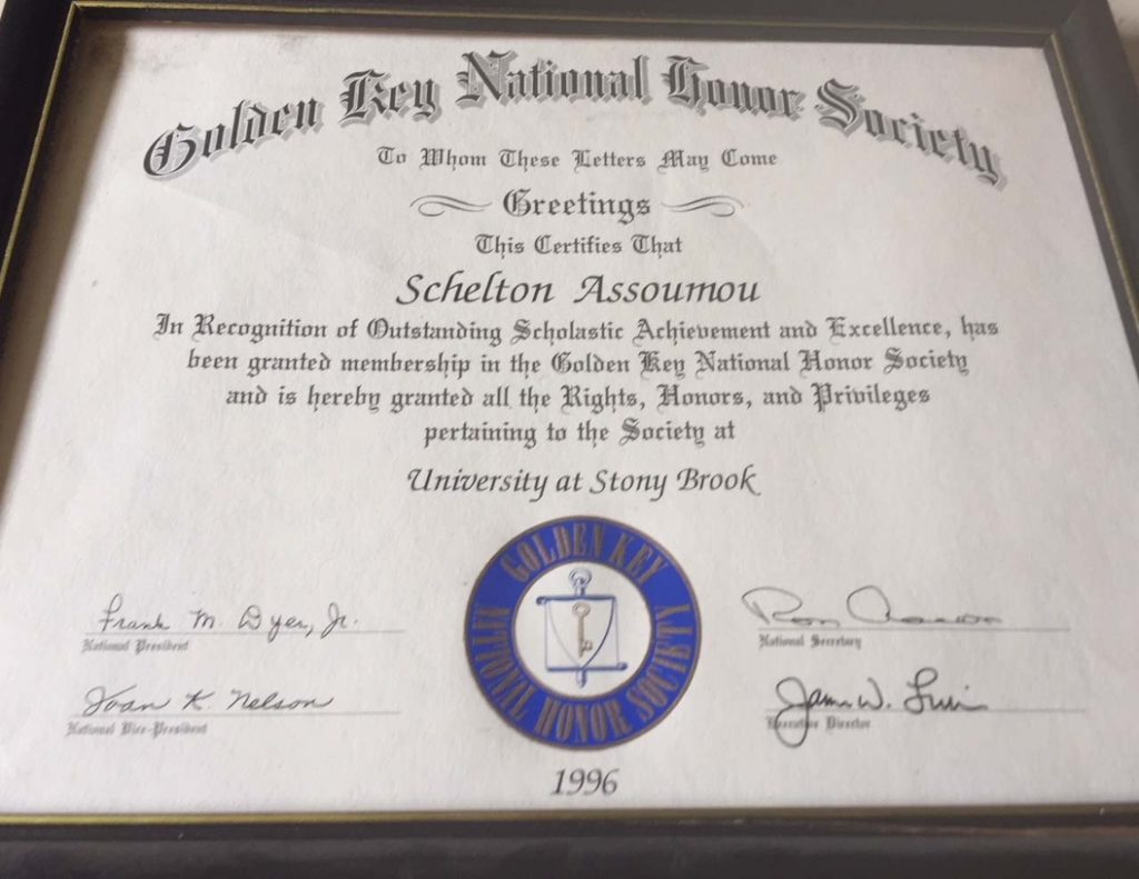 Schelton Assoumou's golden key national honor society award from the University of Stony Brook